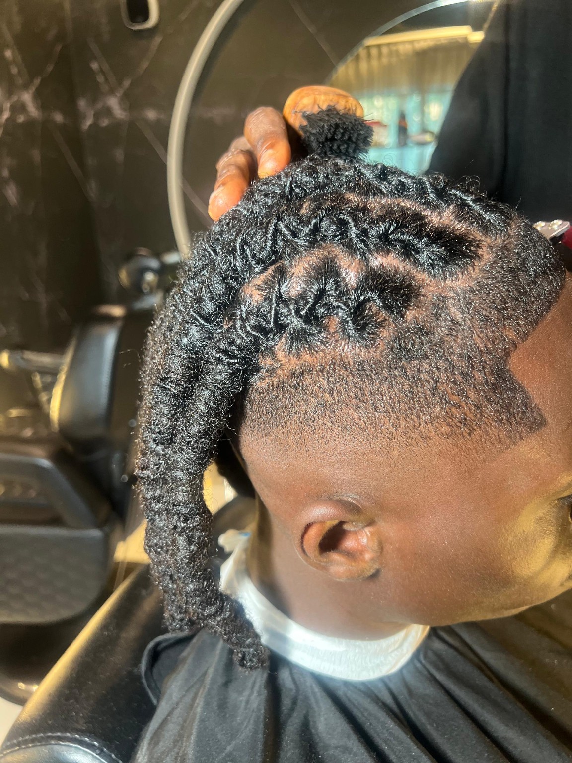 Hair design by Walehairclinc